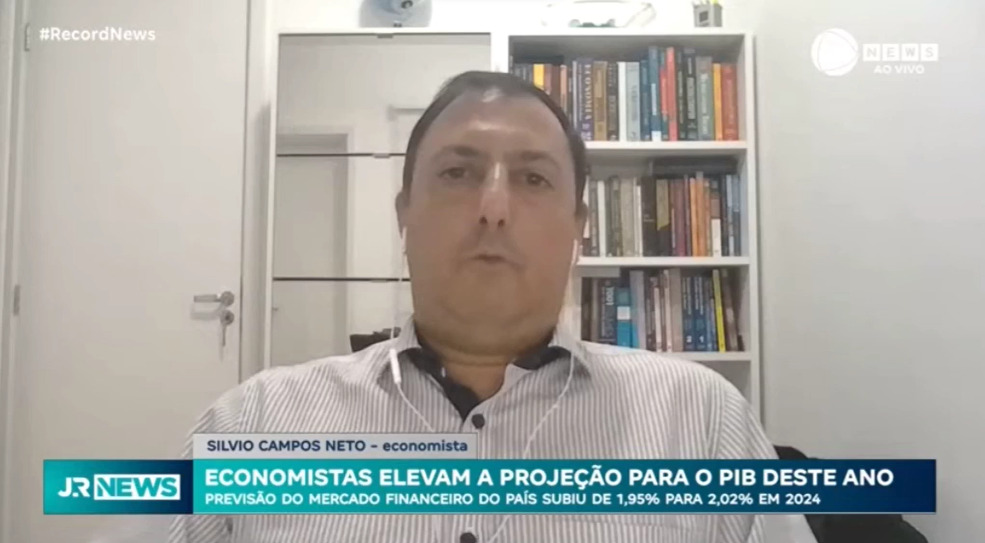 Economistas elevam a projeção para o PIB deste ano: Entrevista com Silvio Campos Neto - economista - Jornal da Record News